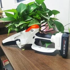 SUPERSELLER Einhand-Elektrokettensäge Bürstenloser Motor Wiederaufladbare Kleine Lithium-Kettensäge Holzfäller- Und Baumschnittwerkzeuge Hochleistungs-Mini-Kettensäge Weiß -Elektrosägen Verkäufe 2022 64683043 3